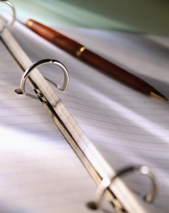 Pen on Notepaper in Ring Binder